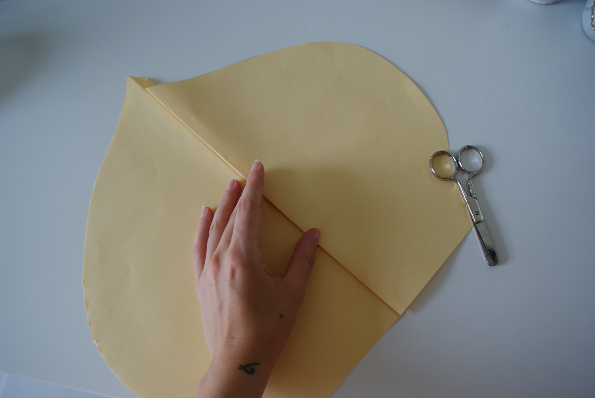 Easy paper fan decorations inspired by faux sun palm leaves